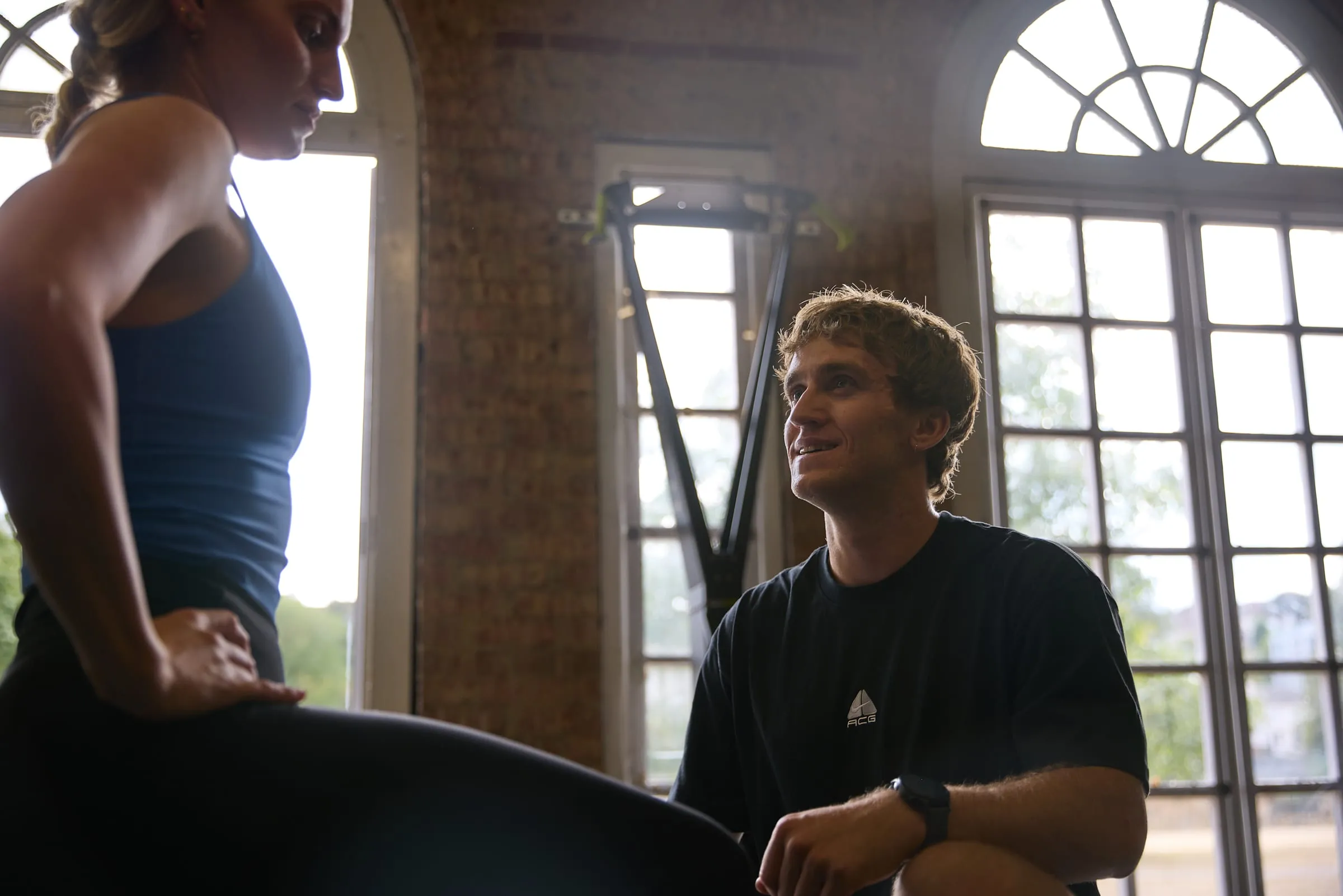 Felix talking with a client before treatment
